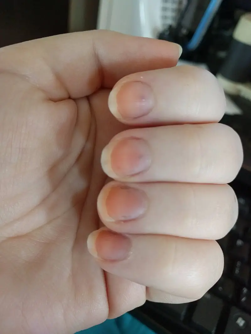 bright orange-colored nails