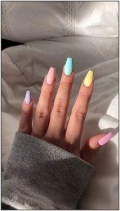 solid with pastels nail design