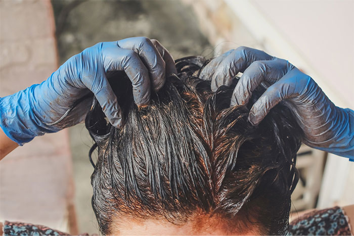 wash hair after applying henna